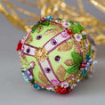 Load image into Gallery viewer, Anna Push Pin Easter Egg Ornament made with metallic trim, green acrylic leaves, and beads - Bottom detail. (Lime).