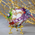 Load image into Gallery viewer, Anna Easter Egg Beaded Ornament embellished with flowers, leaves, gold floral trim, and crystal beads. Top detail. (White).