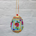 Load image into Gallery viewer, Handmade Easter Egg Beaded Ornament embellished with flowers, leaves, gold floral trim, and crystal beads. Side. (Sky Blue).