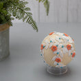 Load image into Gallery viewer, Christmas or Easter Beaded Ornament Ball embellished with flowers, trim, and beads. Handmade. Top detail. (Papaya Whip).