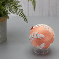 Load image into Gallery viewer, Christmas or Easter Beaded Ornament Ball embellished with flowers, trim, and beads. Handmade. Bottom detail. (Coral).