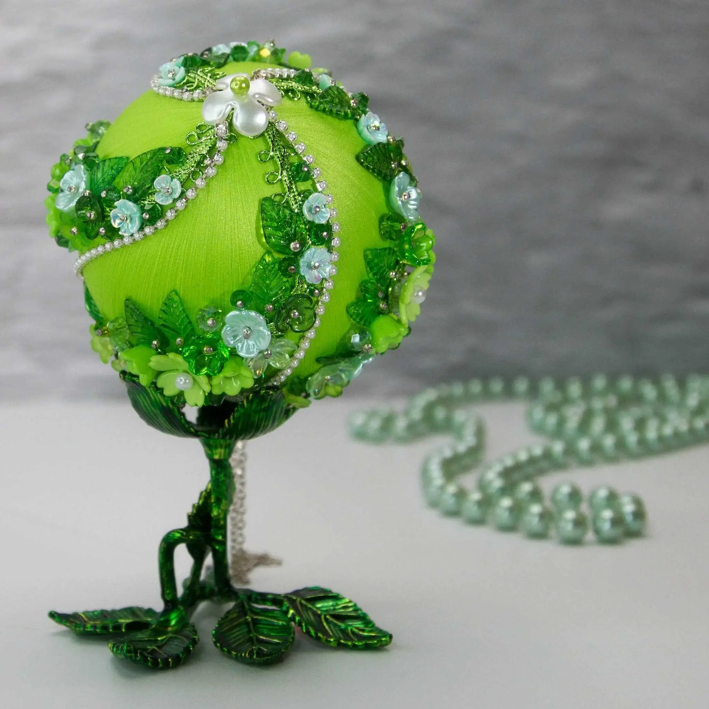 Christmas or Easter Beaded Ornament Ball embellished with acrylic flowers, leaves, and crystal beads. Handmade. Bottom Detail. (Lime).