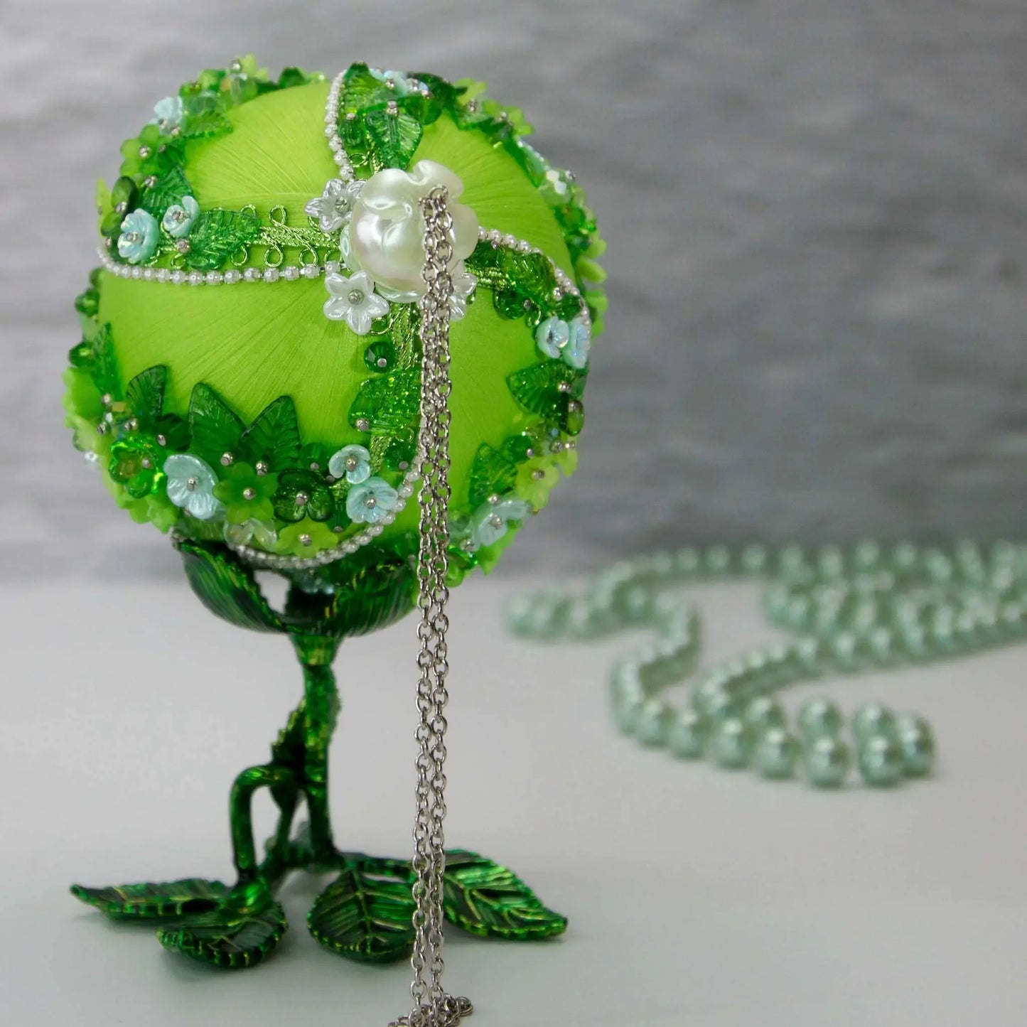 Christmas or Easter Beaded Ornament Ball embellished with acrylic flowers, leaves, and crystal beads. Handmade. Top Detail.(Lime).