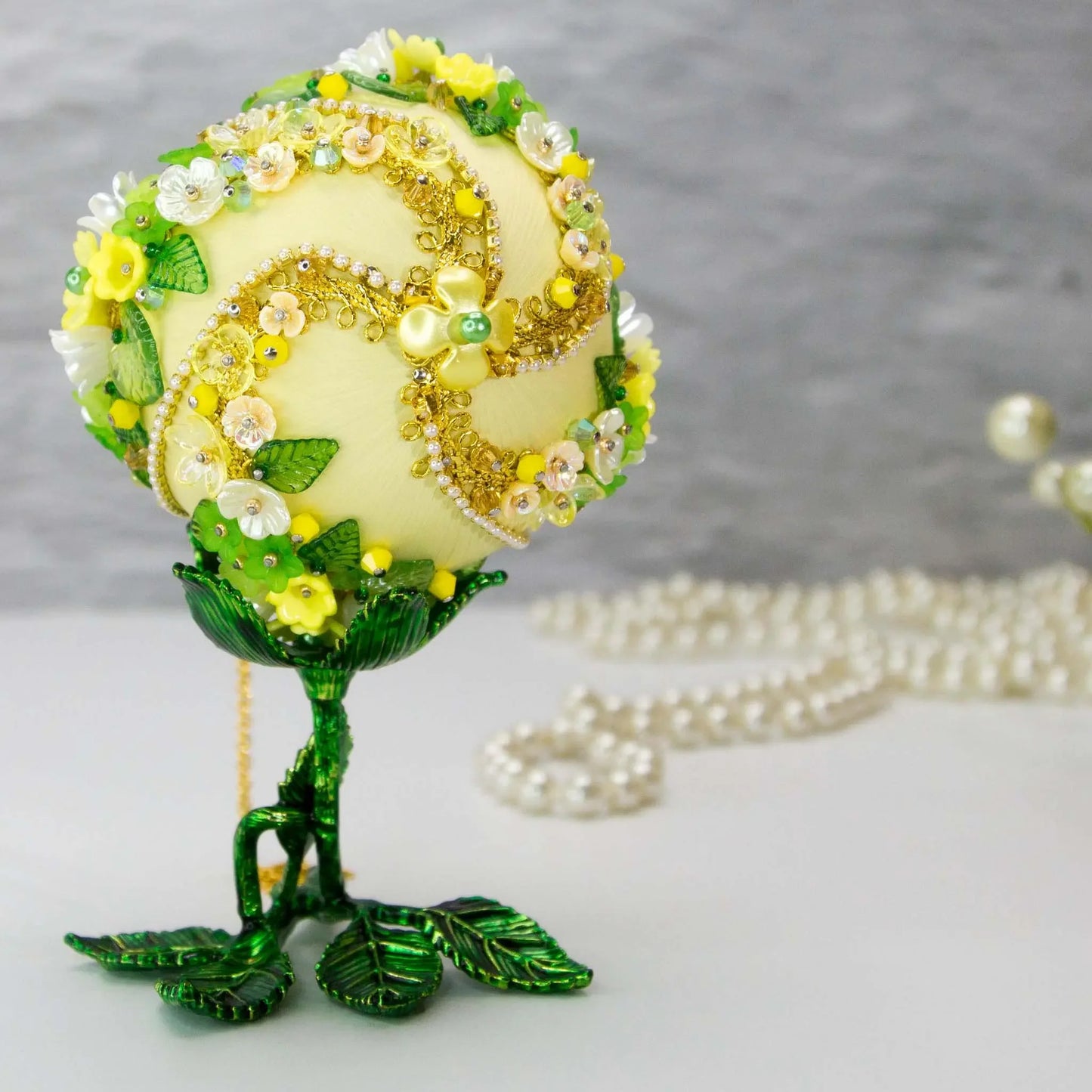 Christmas or Easter Beaded Ornament Ball embellished with flowers, trim, and beads. Handmade. Top detail. (Light Yellow).