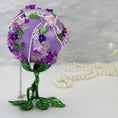 Load image into Gallery viewer, Christmas or Easter Beaded Ornament Ball embellished with flowers, trim, and beads. Handmade. Bottom detail. (Medium Purple).