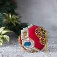Load image into Gallery viewer, Gusornament Satin Ornament -Dark red beaded Christmas Ornament, pictured in sparkling crushed ice, adorned with blue glass rhinestones, beads, and gold chain. (Dark Red)