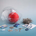 Load image into Gallery viewer, Red ball in a plastic container, pins, dreamcatcher charm. (Crimson)
