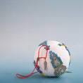 Load image into Gallery viewer, Christmas ornament inspired by indigenous beadwork and patterns with cute feather charm. (White)