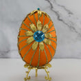 Load image into Gallery viewer, Large gold flower on a handmade Easter egg.