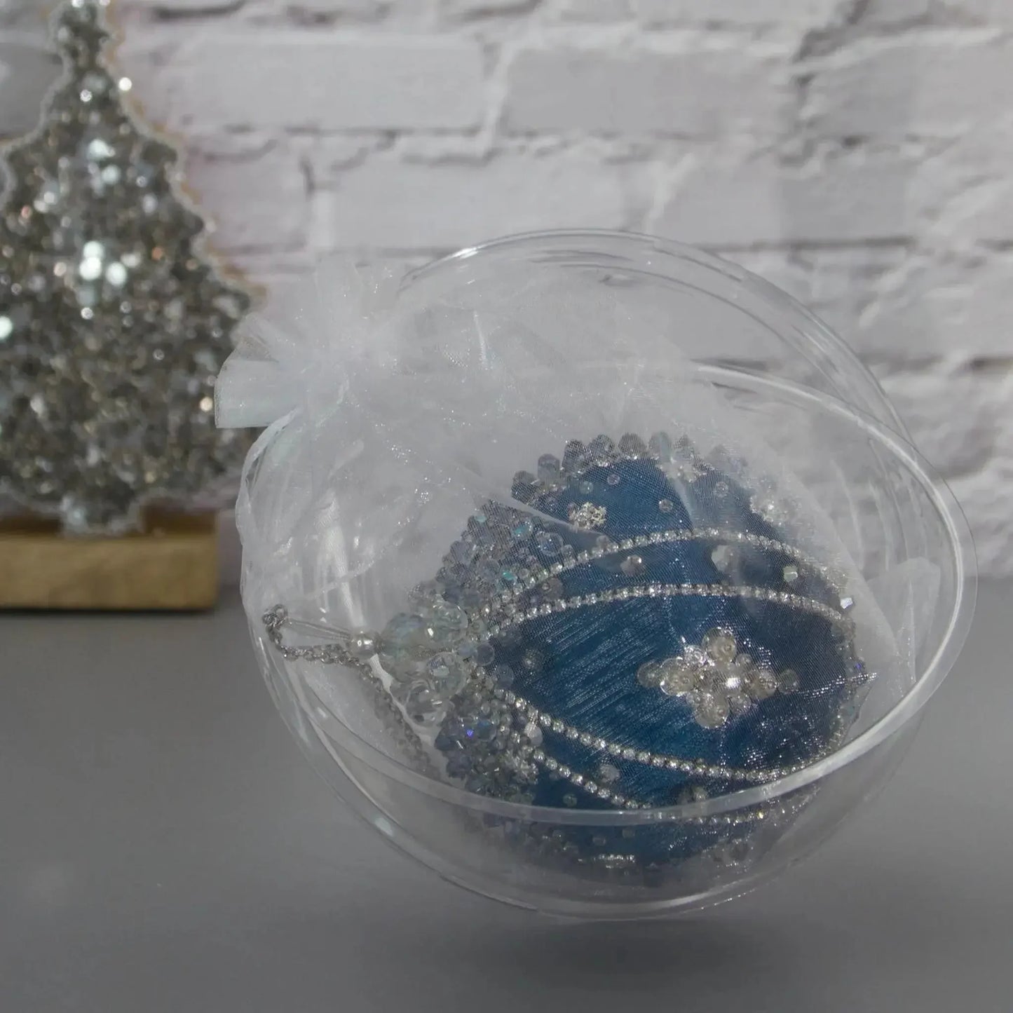 Polar Night Christmas Satin Ornament Kit - Packaging with Round Plastic Storage Container, finished ornament.