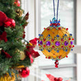 Load image into Gallery viewer, Christmas ornament with colorful gemstones hanging on a tree.