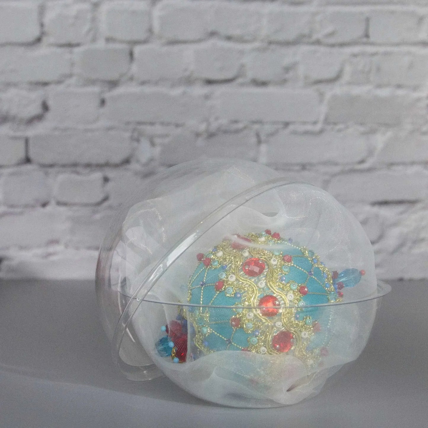 Scheherazade Handmade Satin Ornament in a handy clear round container for storage - from Whim5seasons, packaging. (LightSeaGreen)