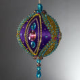 Load image into Gallery viewer, Christmas Beaded Ornament Kit Ball embellished with glass rhinestones, gold braided trim, and crystal beads. Front. (Indigo).