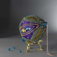 Load image into Gallery viewer, Christmas Beaded Ornament Kit Ball embellished with glass rhinestones, gold braided trim, and crystal beads. Top detail. (Indigo).