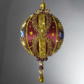 Load image into Gallery viewer, Christmas Beaded Ornament Kit Ball embellished with glass rhinestones, gold braided trim, and crystal beads. Front. (Maroon).