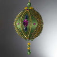 Load image into Gallery viewer, Christmas Beaded Ornament Ball embellished with large glass color-shifting rhinestones, gold braided trim, and crystal beads. (Olive).