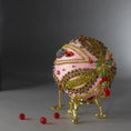 Load image into Gallery viewer, Christmas Beaded Ornament Kit Ball embellished with glass rhinestones, gold braided trim, and crystal beads. Bottom detail. (Light Pink).