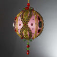 Load image into Gallery viewer, Christmas Beaded Ornament Kit Ball embellished with glass rhinestones, gold braided trim, and crystal beads. Side view. (Light Pink).