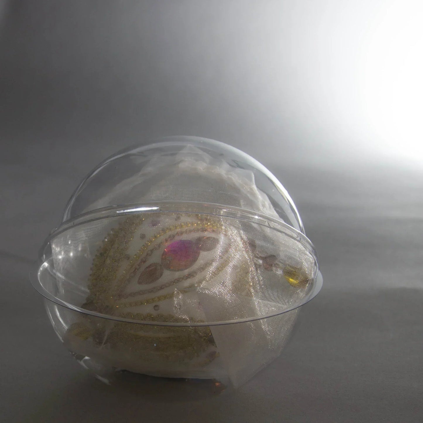 Handmade Christmas Beaded Ornament Ornament Uliger wrapped in organza and packed in a round clear container for storing. (White).