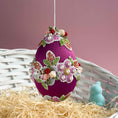 Load image into Gallery viewer, Easter egg with floral embellishments on a pink background. (Purple)