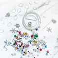 Load image into Gallery viewer, Jingle Bells Christmas Satin Ornament Kit-Materials include metallic cord, satin ball, sequins, crystal beads, rhinestones, and alloy snowflakes.