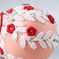 Load image into Gallery viewer, Handmade Christmas or Easter Beaded push pin Ornament Ball embellished with small red embroidered flowers, white trim, and beads. (Coral)