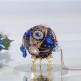Load image into Gallery viewer, A side of a satin handcrafted dark blue push pin Christmas ornament with gold beads and cameos applied to the satin foam core with dressmaker pins by Whim5seasons. (Navy)