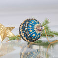 Load image into Gallery viewer, A close up detail of a Handmade Christmas Push Pin Ornament New Year Star showcasing sparkling rhinestones and crystal beads, on a reflective surface. (Dark Slate Blue)