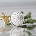 Load image into Gallery viewer, Completed Handmade Christmas Push Pin Ornament with star design on a reflective surface with greenery and gold star in the background. (White)