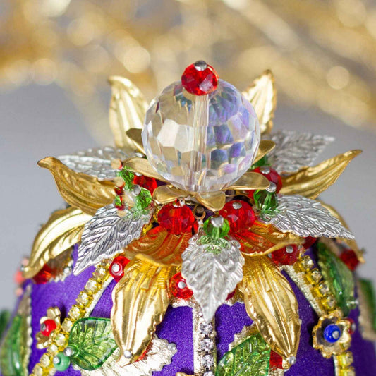 Close up of a handmade Easter Egg push pin ornament embellished with flowers, gold leaves, gold floral trim, and crystal beads - close-up of a top crystal bead by Whim5seasons.