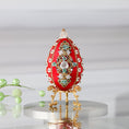 Load image into Gallery viewer, Luxurious handmade push pin Easter Egg in red on a gold stand set against a light background featuring gold, deep red, and silver colors. (Dark Red)