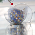 Load image into Gallery viewer, Bright blue festive handmade Christmas ornament with rhinestones, gold trim, sequins, in a container on a reflective surface set against a light gray background. (Dark Slate Blue)
