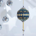 Load image into Gallery viewer, New Year Star Sequin Ornament from Whim5seasons features shiny rhinestone chains, gold star trim and sequin set on a rich fark blue satin ball. (Dark Slate Blue)