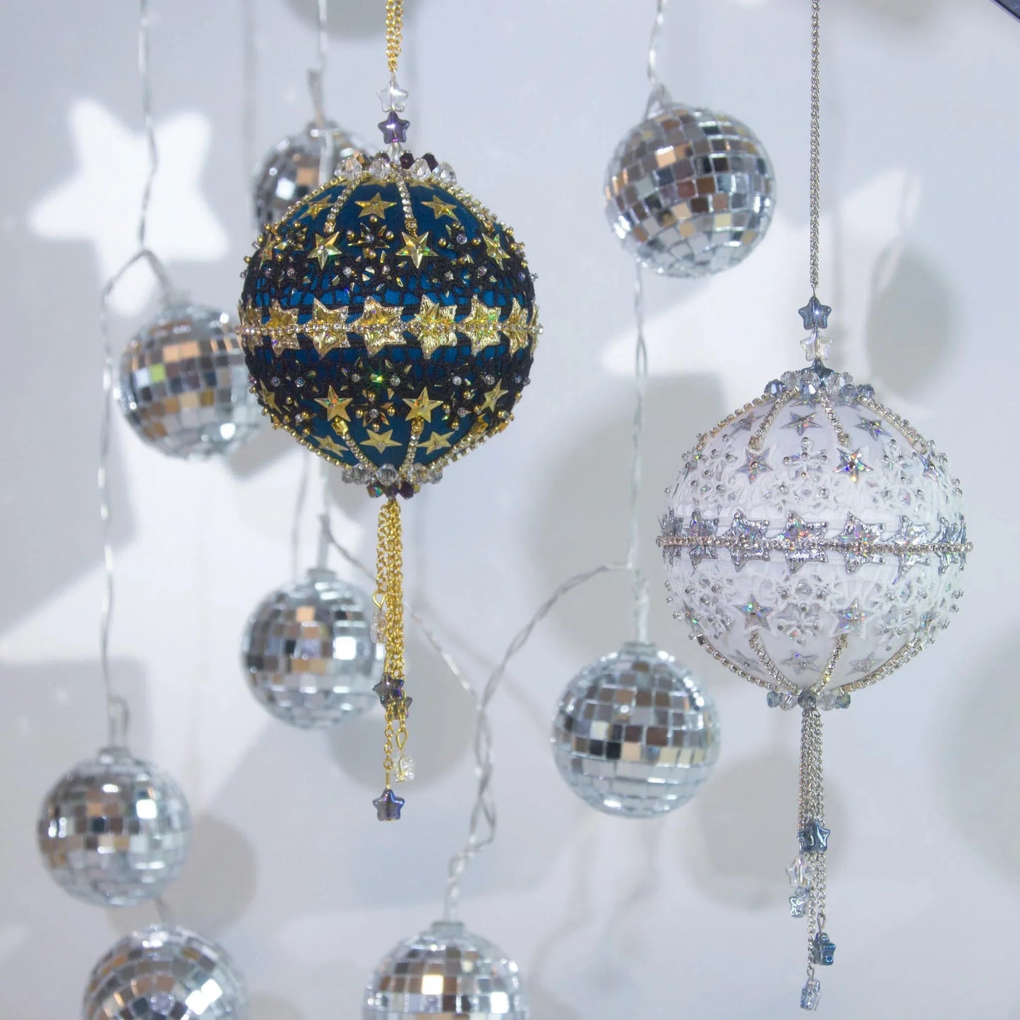 A collection of dazzling handmade New Year Star Ornament Collection from Whim5seasons. Add holiday sparkle to you Christmas decor!