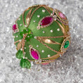 Load image into Gallery viewer, Close-up of DIY Phoenix Christmas Beaded Handmade Push Pin Ornament embellished with gold cameos, metal accents, and rose old chain. (Olive)
