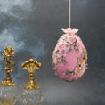 Load image into Gallery viewer, Handmade Easter Egg Satin Ornament by Whim5seasons - white satin egg with pink plum bloom embroidery patches and silver cording. (Light Pink)