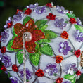 Load image into Gallery viewer, Close-up detail of Satin Handmade Ornament Trellis item with colorful flowers and a pearl on a white. (White).