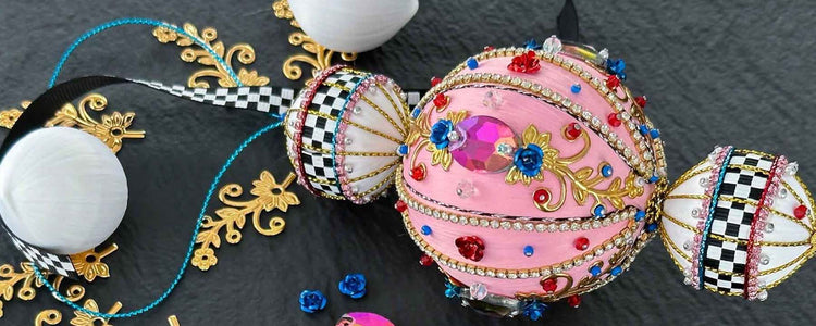 Playful pink ornament with a racetrack ribbon