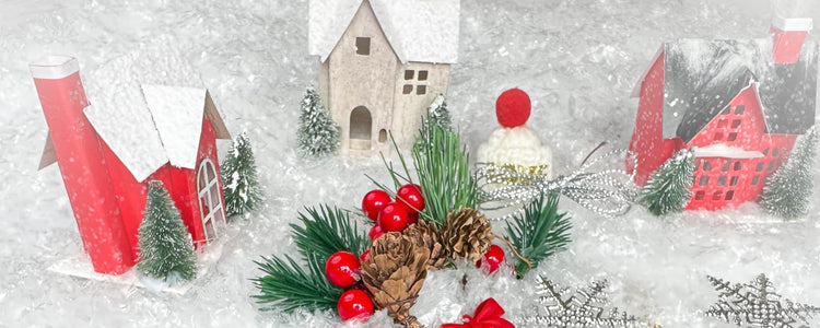 Small toy houses in a fluffy snow