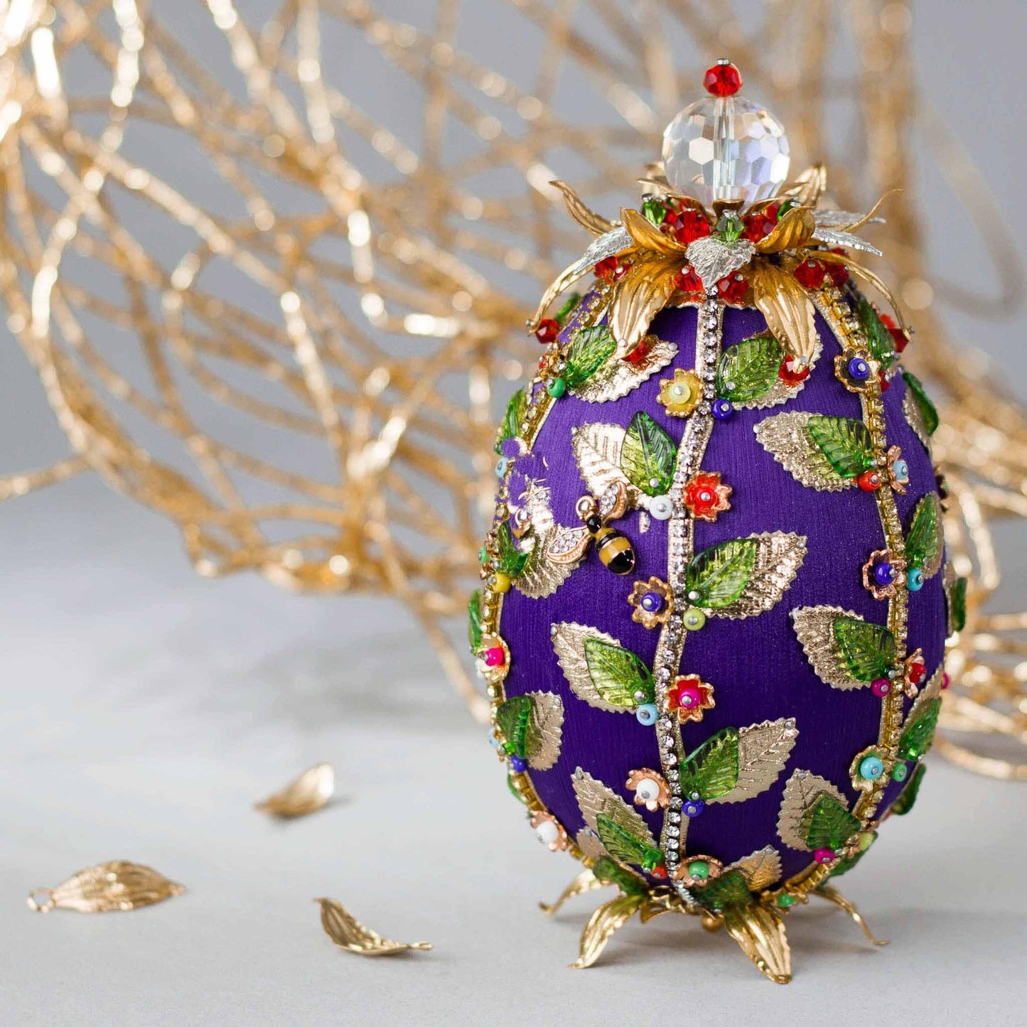 Large Purple Satin Easter Egg Beaded Ornament embellished with flowers, leaves, gold floral trim, and crystal beads - by Whim5seasons. (Indigo).