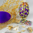 Load image into Gallery viewer, Materials to make Beautiful Easter Egg Satin Ornament  - rhinestones chains, gold leaves, and crystal beads to a satin ball. (Indigo).
