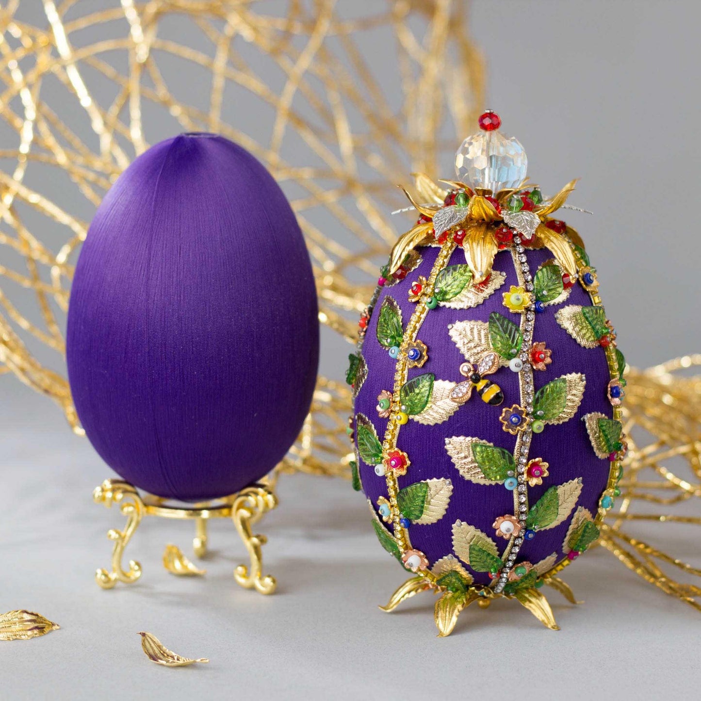 Materials to make Beautiful Easter Egg Satin Ornament  - rhinestones chains, gold leaves, and crystal beads to a satin ball. (Indigo).