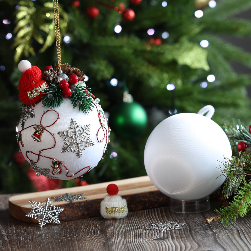 Vintage Christmas Satin Ornament kit with a Christmas Tree on in the background.