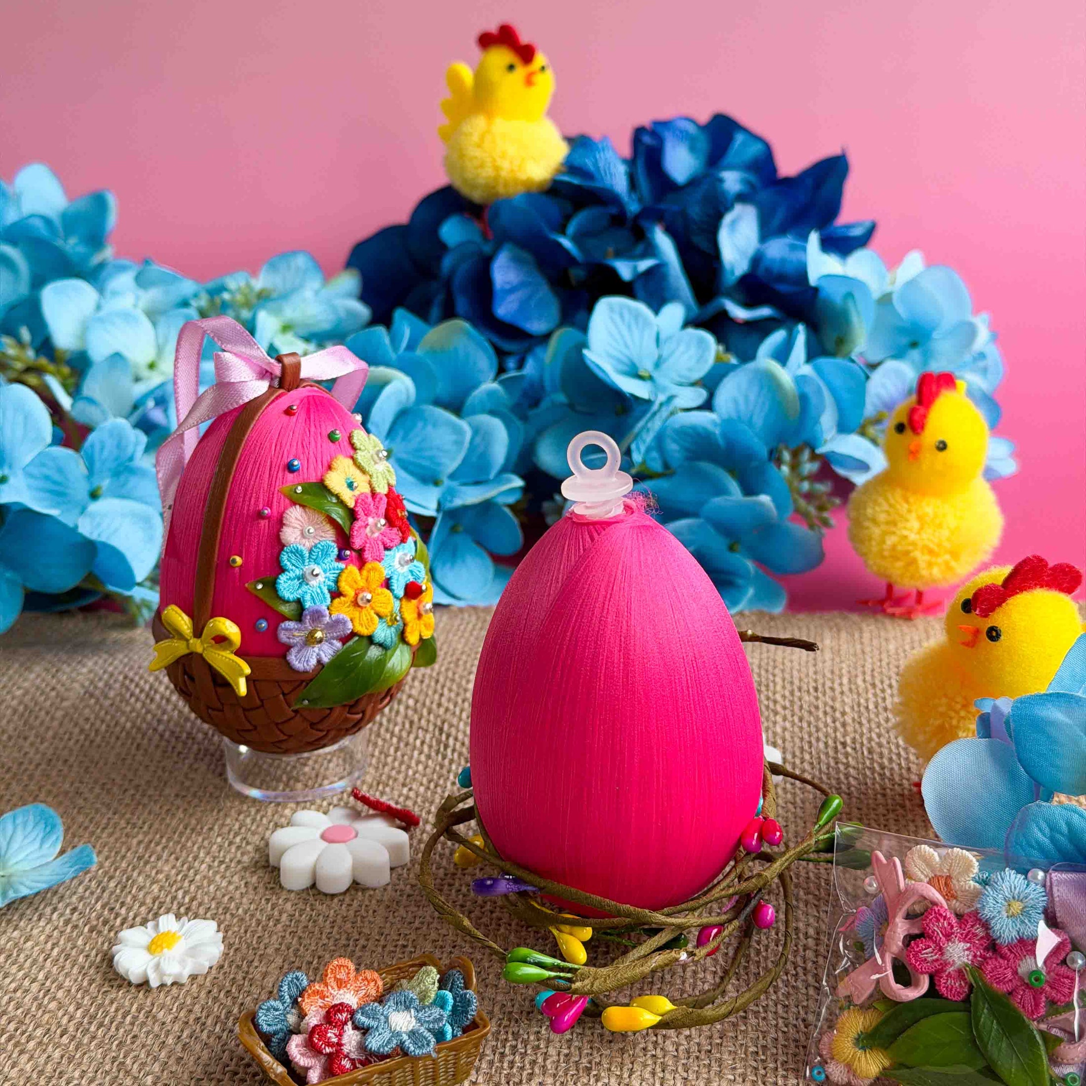Colorful Easter egg push pin kit and chicks with flowers on a pink background.  (Medium Pink)