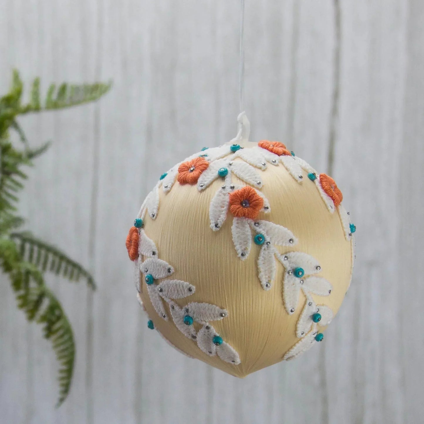 Christmas or Easter Beaded Ornament Ball embellished with flowers, trim, and beads. Handmade. (Papaya Whip).