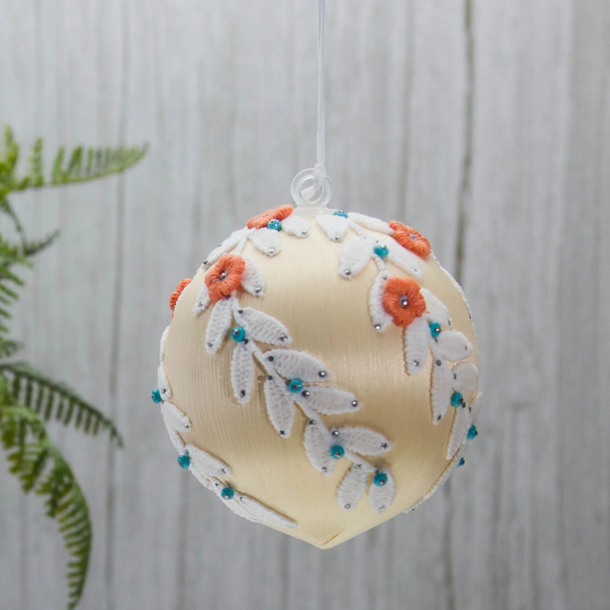 Christmas or Easter Beaded Ornament Ball embellished with flowers, trim, and beads. Handmade. (Papaya Whip).