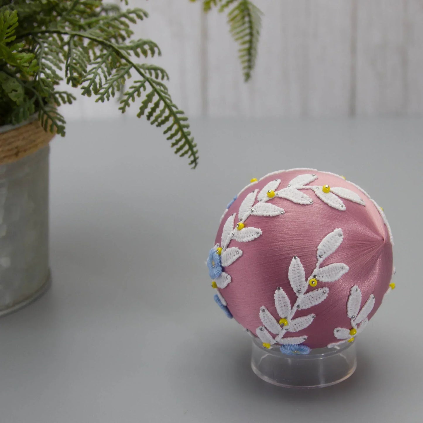 Christmas or Easter Beaded Ornament Ball embellished with flowers, trim, and beads. Handmade. Bottom detail. (Pale Violet Red).