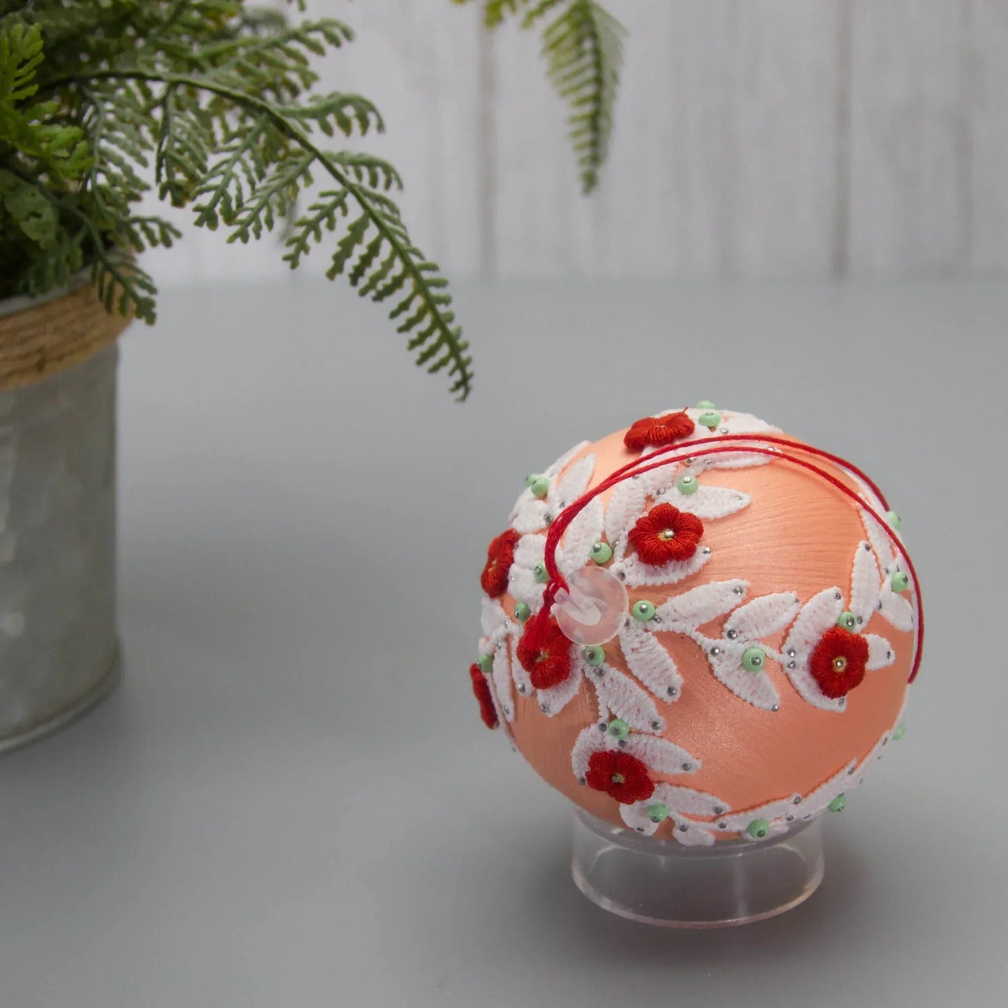 Christmas or Easter Beaded Ornament Ball embellished with flowers, trim, and beads. Handmade. Top detail. (Coral).