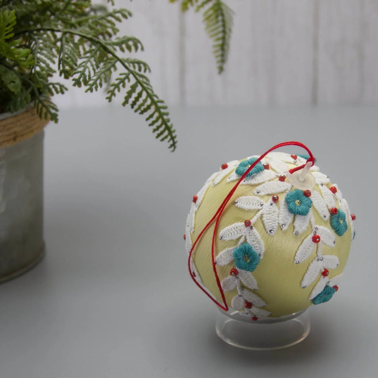 Christmas or Easter Beaded Ornament Ball embellished with flowers, trim, and beads. Handmade. Top Detail. (Khaki).