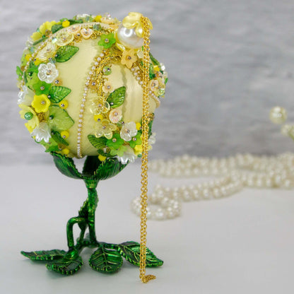 Christmas or Easter Beaded Ornament Ball embellished with acrylic  flowers, leaves, and crystal beads. Handmade. Top detail. (Light Yellow).